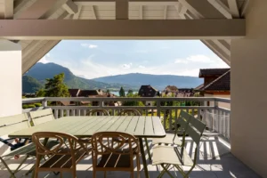 Terrace with lake and mountain views, griddle – Le Duplex de Talloires