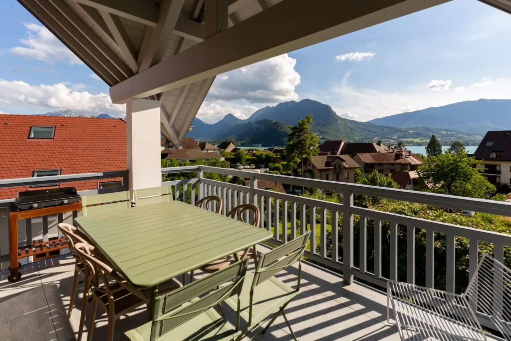 Terrace with lake and mountain views, griddle – Le Duplex de Talloires